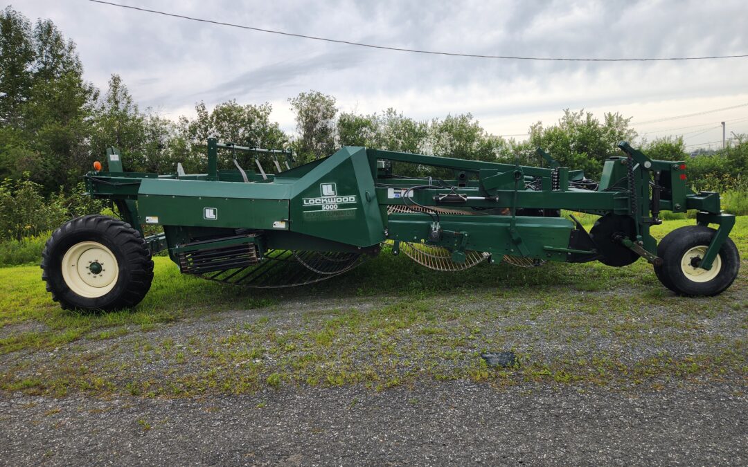 5000 Reconditioned 4-Row Windrower